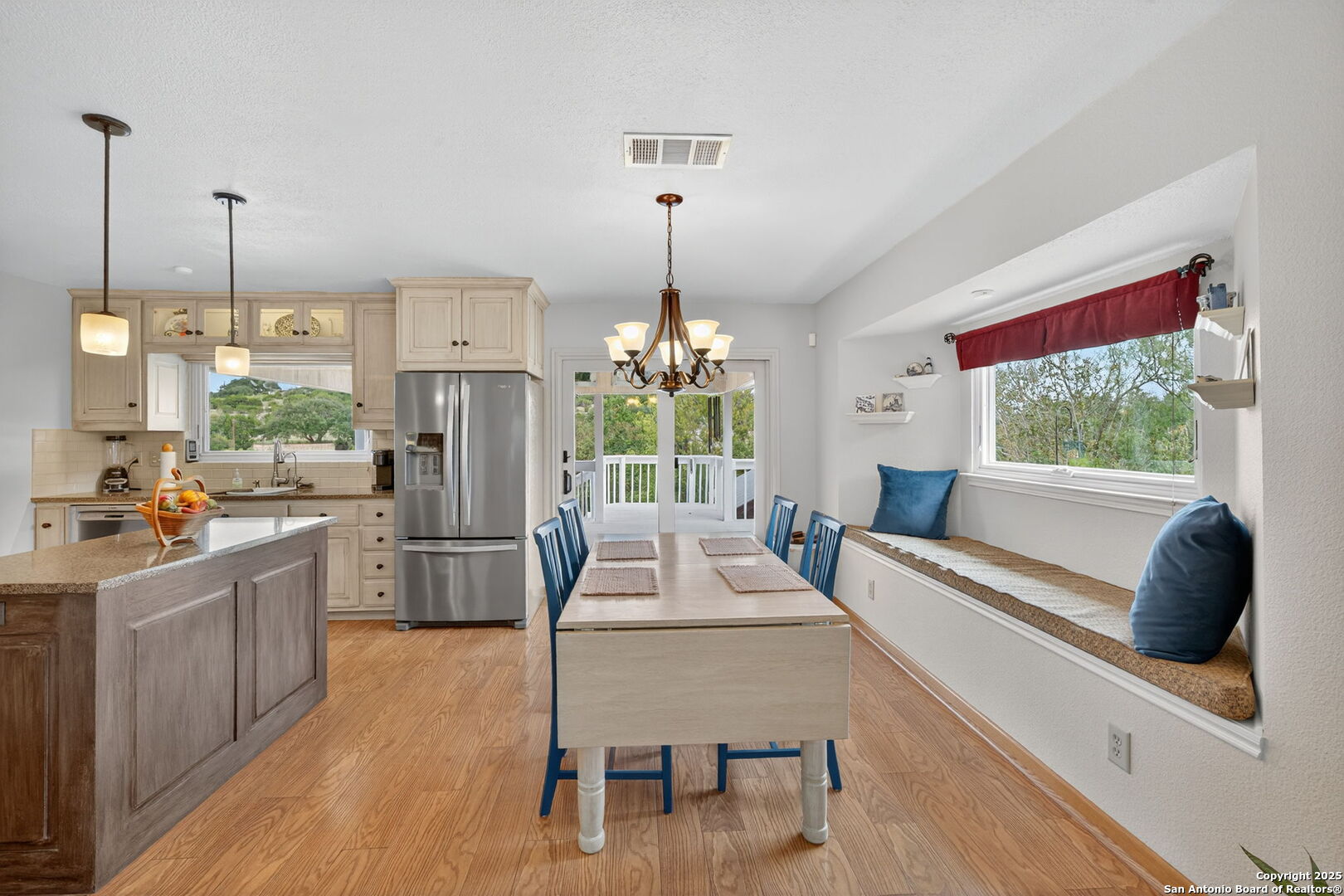 175 Forest Oaks Lane Lakehills, TX 78063 - Photo 8 of 36 a living room with furniture and a large window