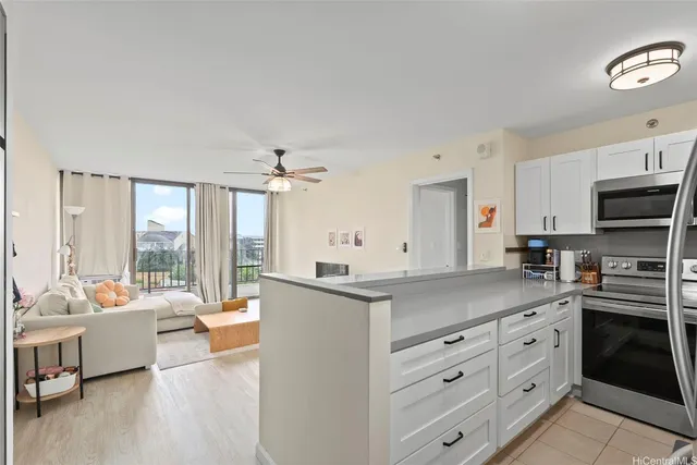 a spacious bedroom with a bed and a couch