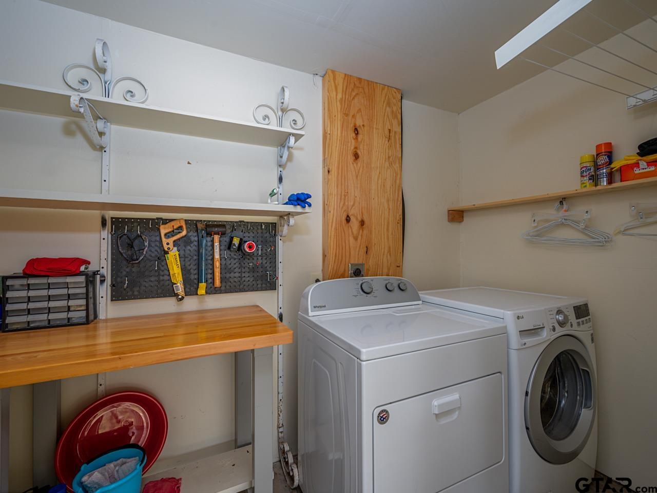 2722 McDonald Road Tyler, TX 75701 - Photo 13 of 28 a utility room with dryer and washer