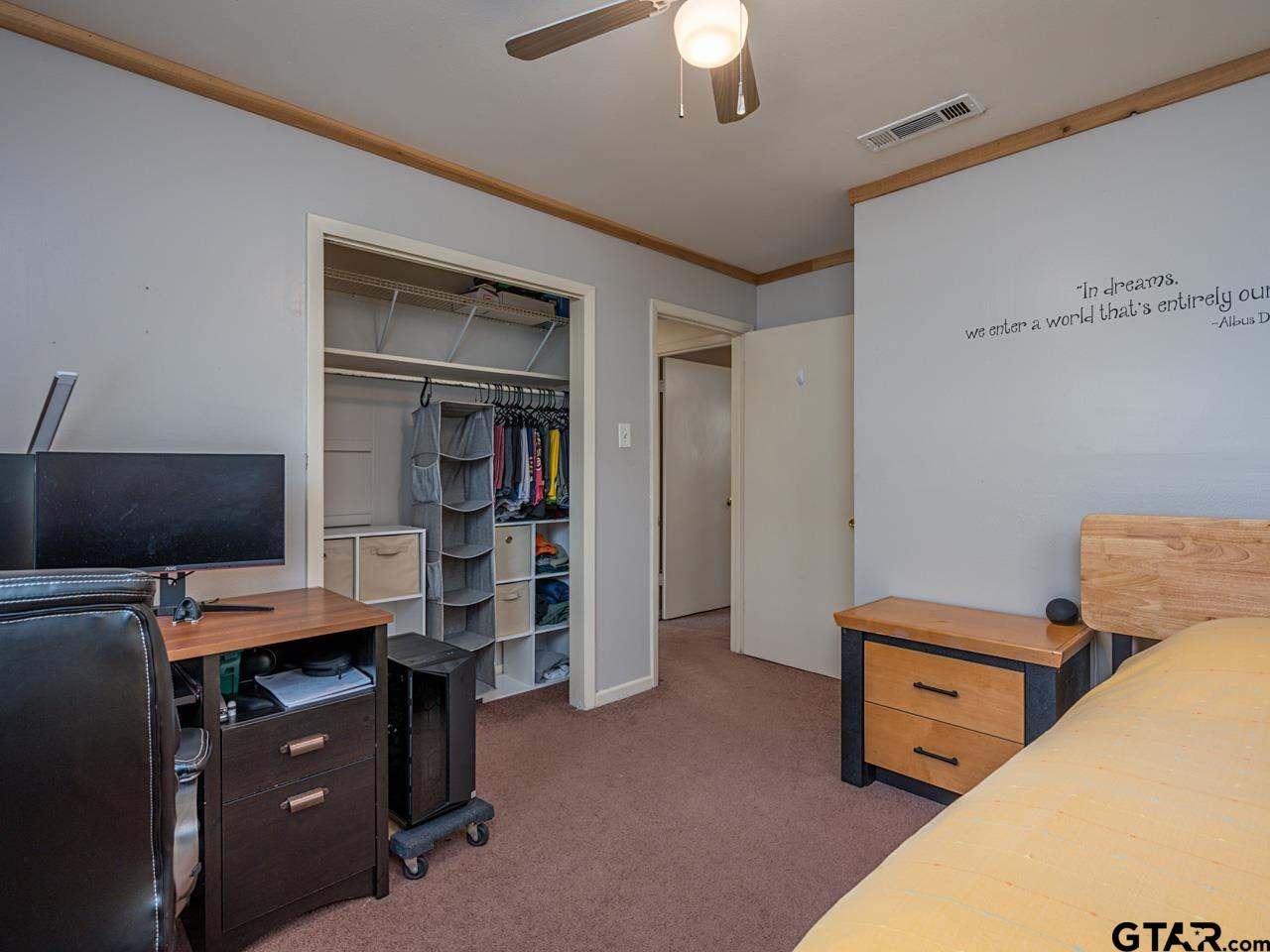2722 McDonald Road Tyler, TX 75701 - Photo 20 of 28 a bedroom with a workspace