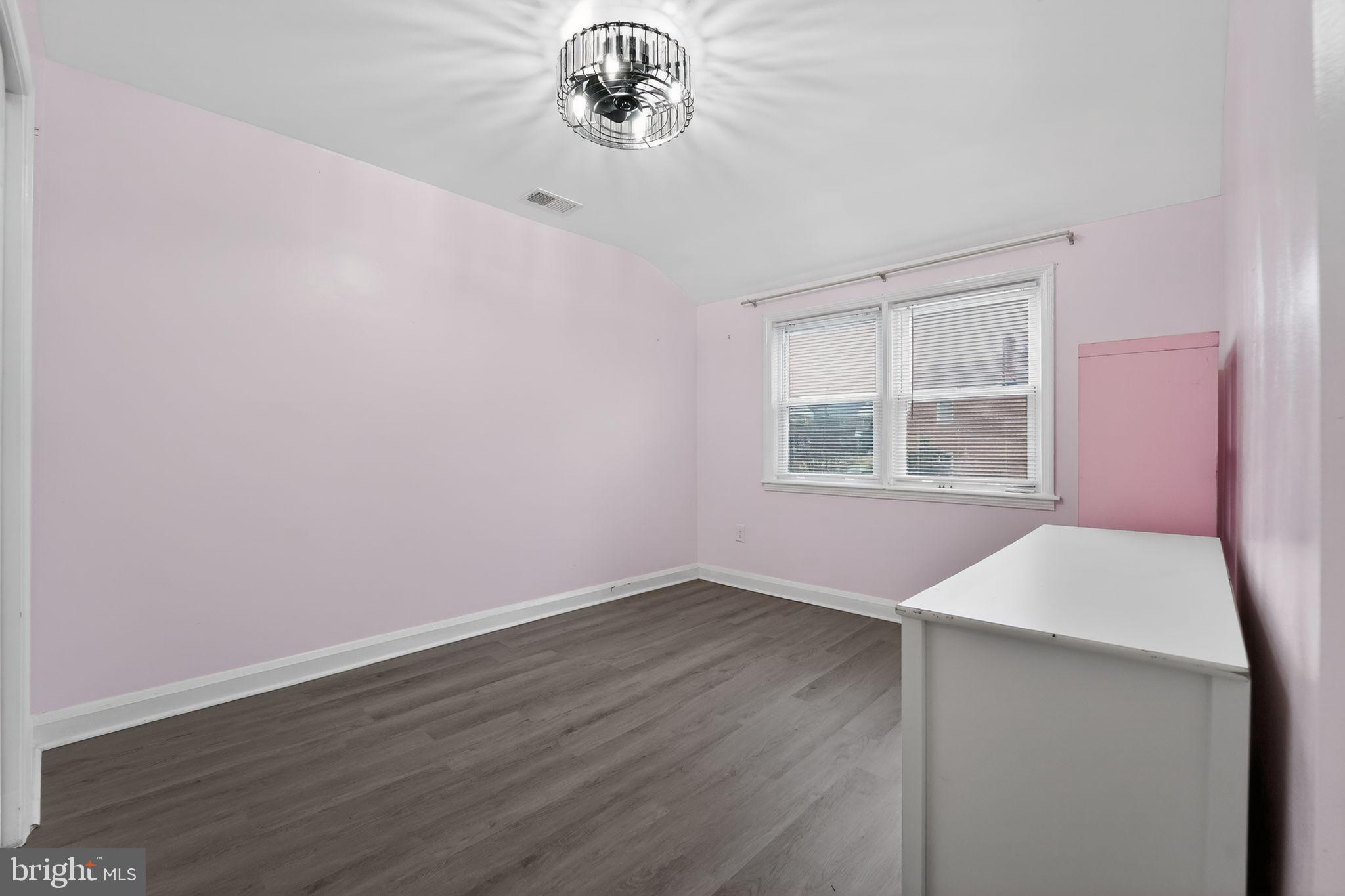 1371 East Northern Parkway Baltimore, MD 21239 - Photo 17 of 29 Charming pastel room with natural light.