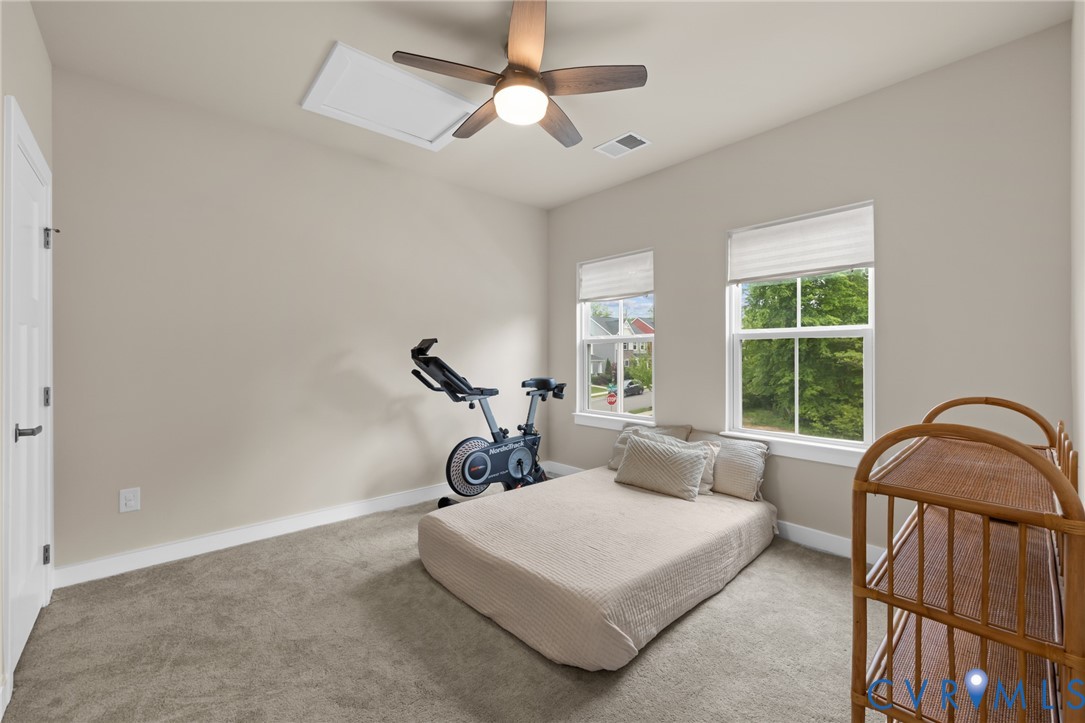 6504 Kinns Road Richmond, VA 23225 - Photo 20 of 34 Carpeted room with a ceiling fan light fixture