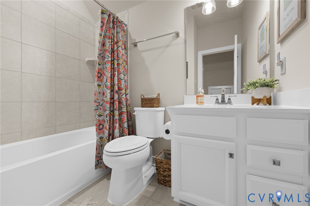 6504 Kinns Road Richmond, VA 23225 - Photo 22 of 34 Full bathroom featuring a white vanity with integr