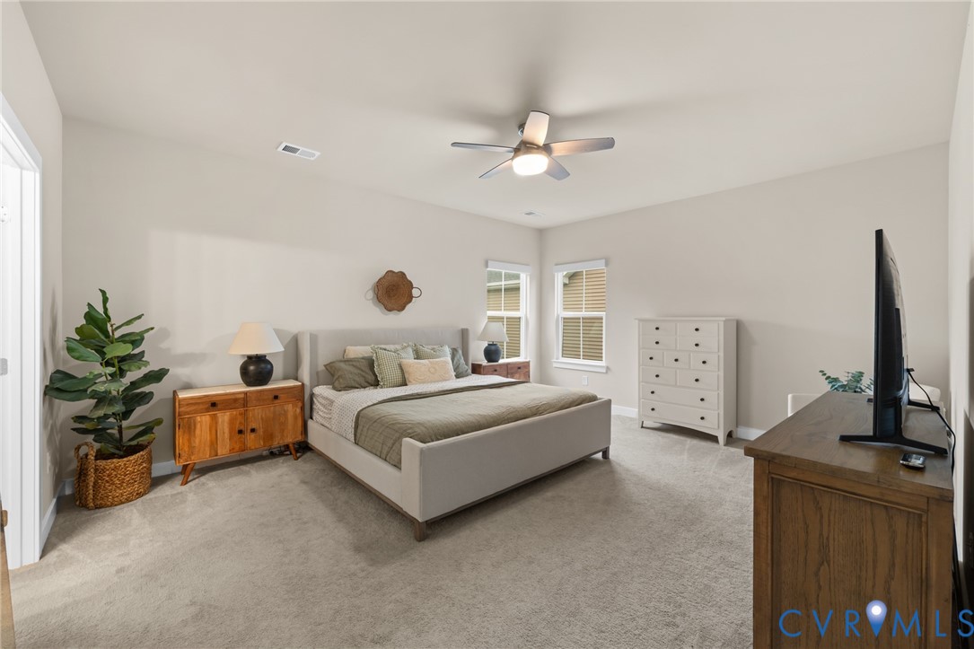 6504 Kinns Road Richmond, VA 23225 - Photo 23 of 34 Spacious room featuring vaulted ceilings, light ne