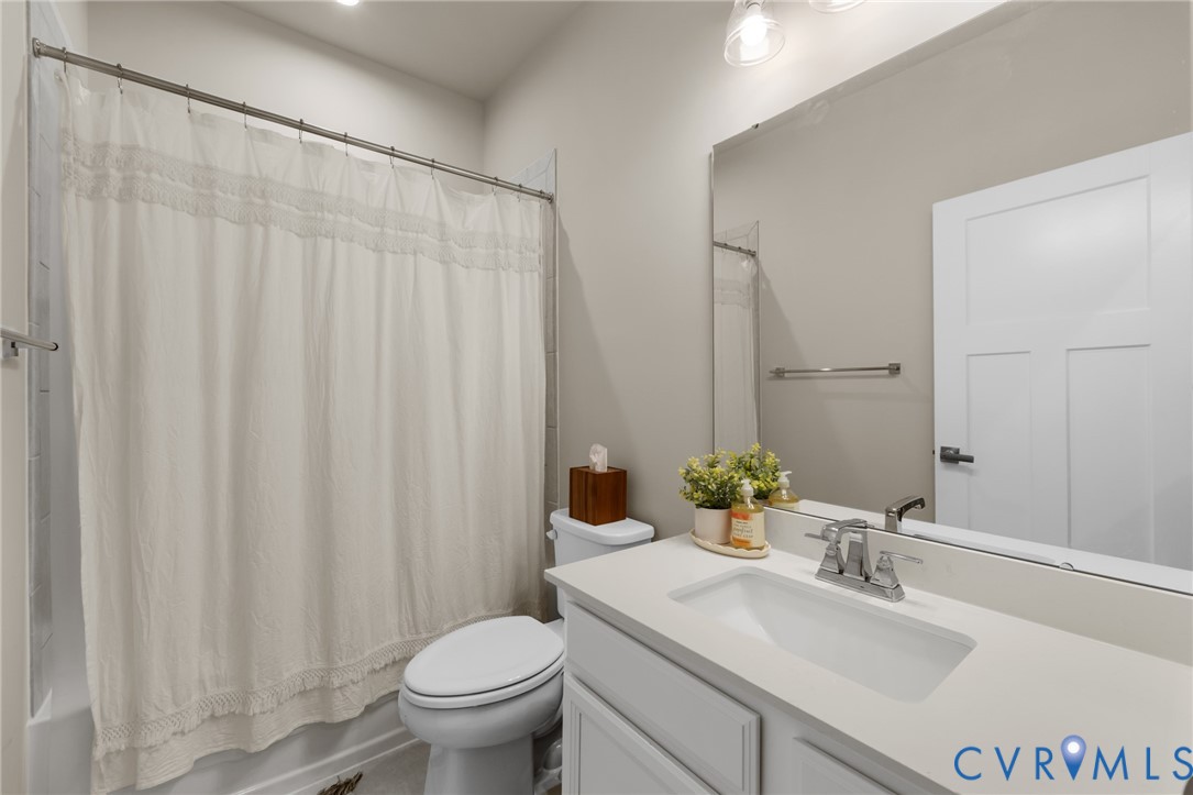 6504 Kinns Road Richmond, VA 23225 - Photo 26 of 34 Bathroom featuring a white vanity with an integrat