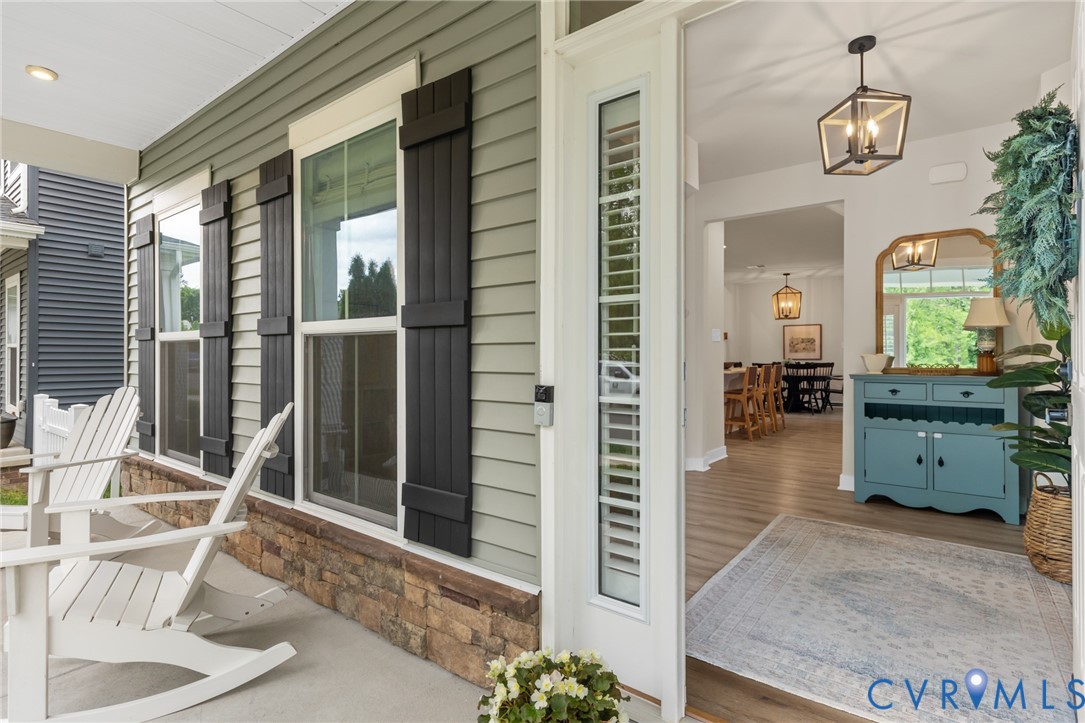 6504 Kinns Road Richmond, VA 23225 - Photo 5 of 34 Inviting front porch entrance with grey siding, st