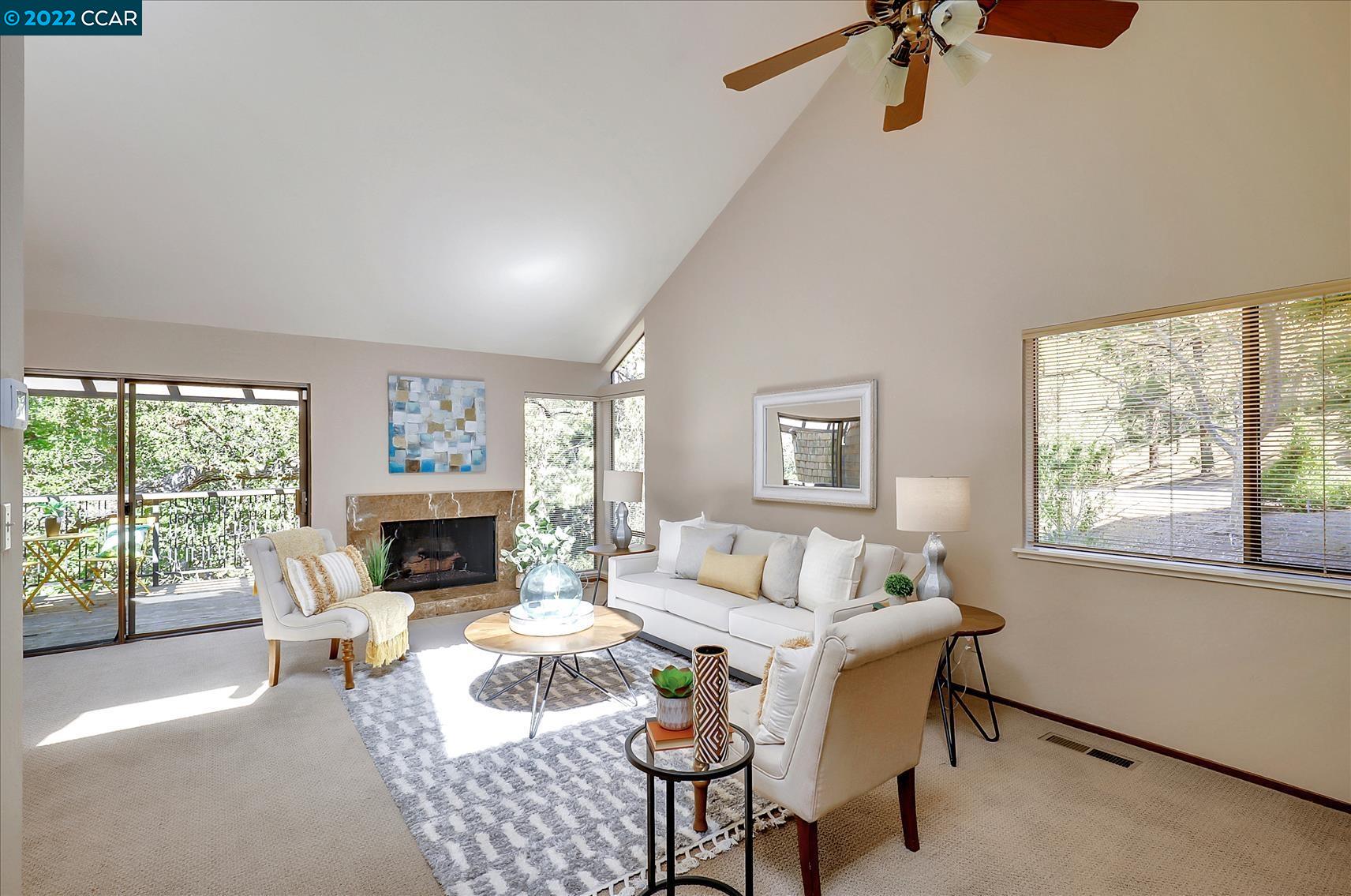 241 Village Gate Road Orinda, CA 94563 - Photo 1 of 1 a living room with furniture and a fireplace