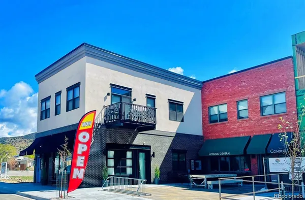 a view of a building with a street