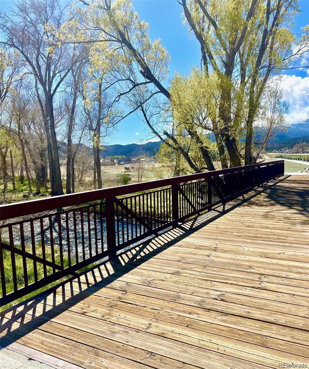 111 Southside Loop Salida, CO 81201 - Photo 2 of 15 a view of balcony with wooden floor and fence