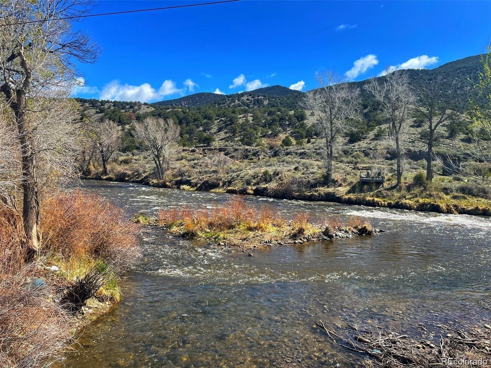 111 Southside Loop Salida, CO 81201 - Photo 10 of 15 a view of a lake with a mountain