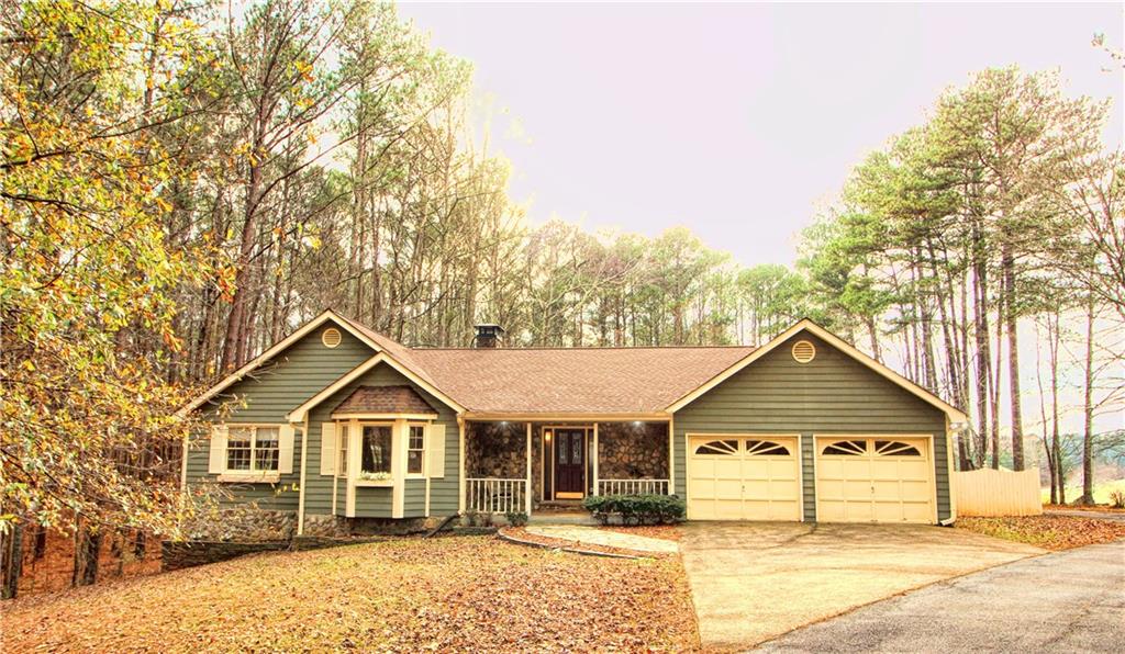 4995 Giles Road Northwest Acworth, GA 30101 - Photo 1 of 1 Hard to Find Ranch with Finished Basement on Over 3 Acres in Prime Cobb County Location!