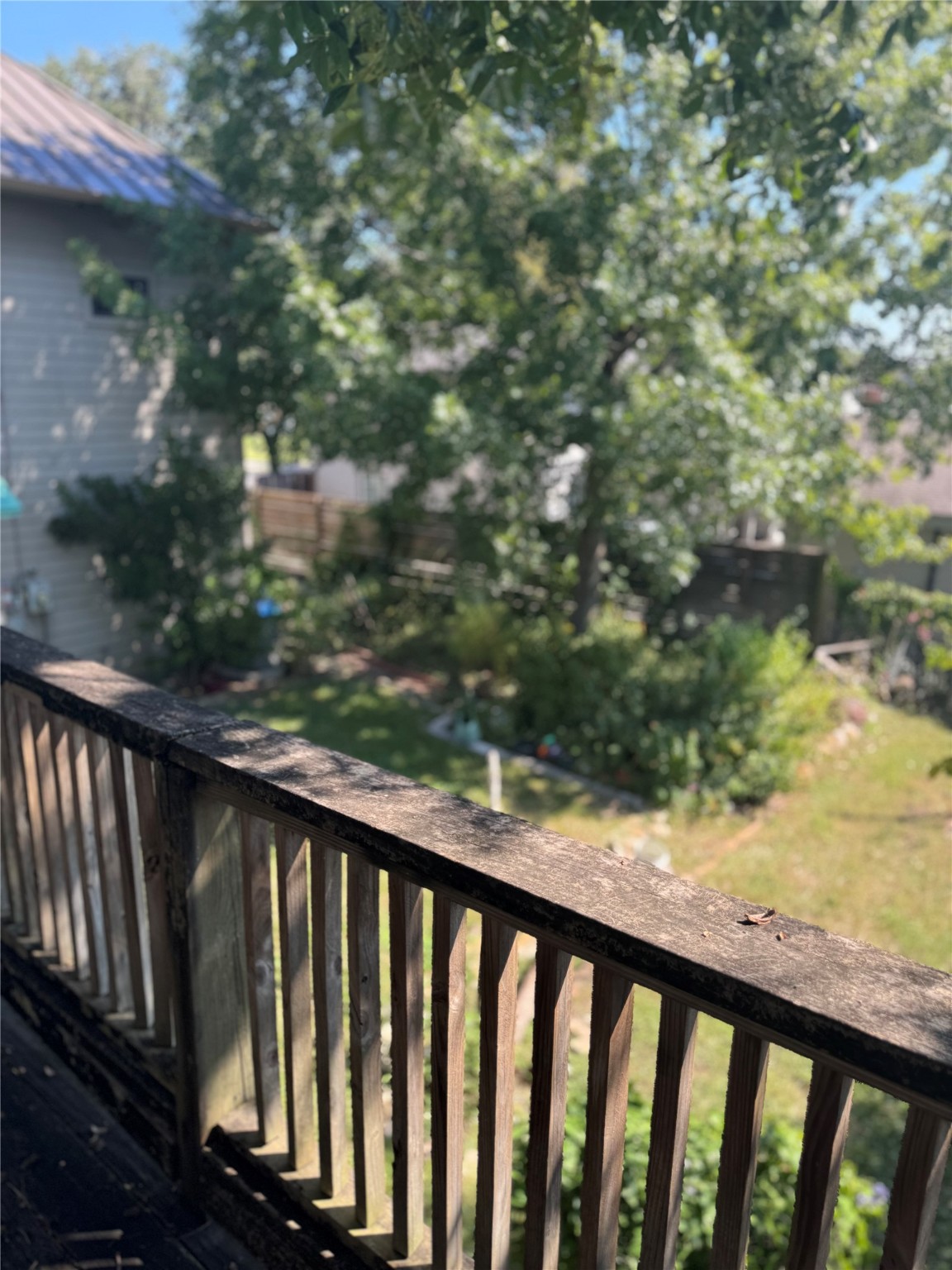 3934 Fernwood Drive, Unit A Houston, TX 77021 - Photo 10 of 10 a balcony with wooden floor and fence