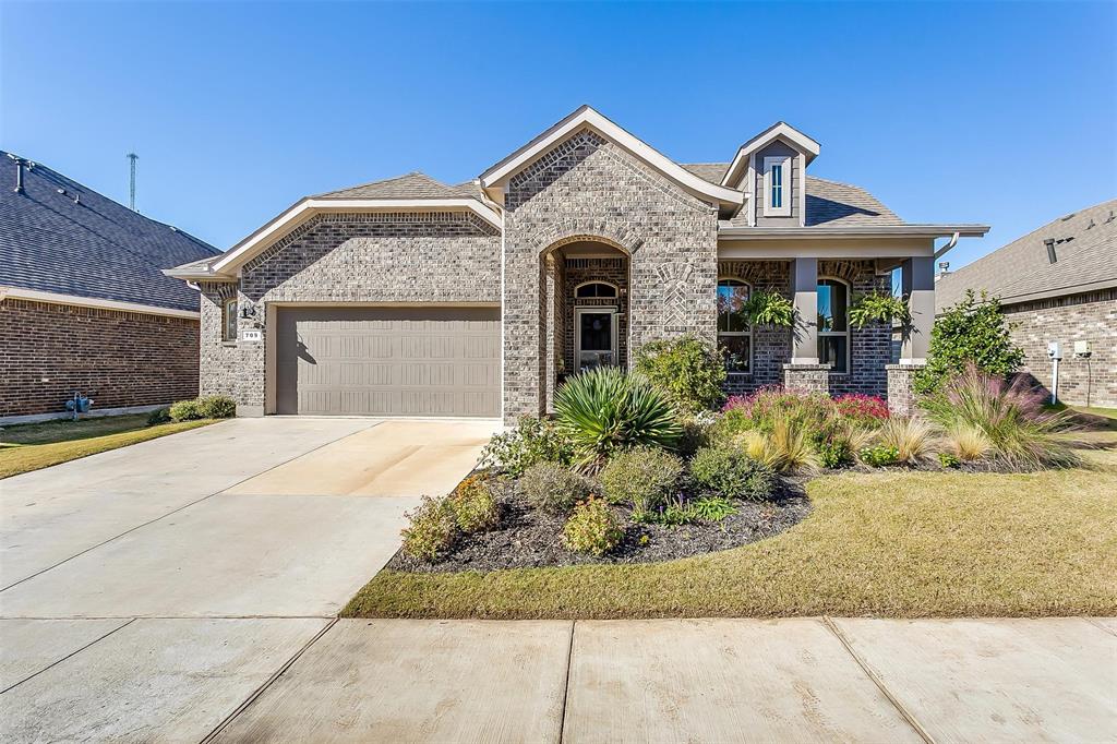 709 Falcon Road Northlake, TX 76226 - Photo 1 of 1 a front view of a house with garden