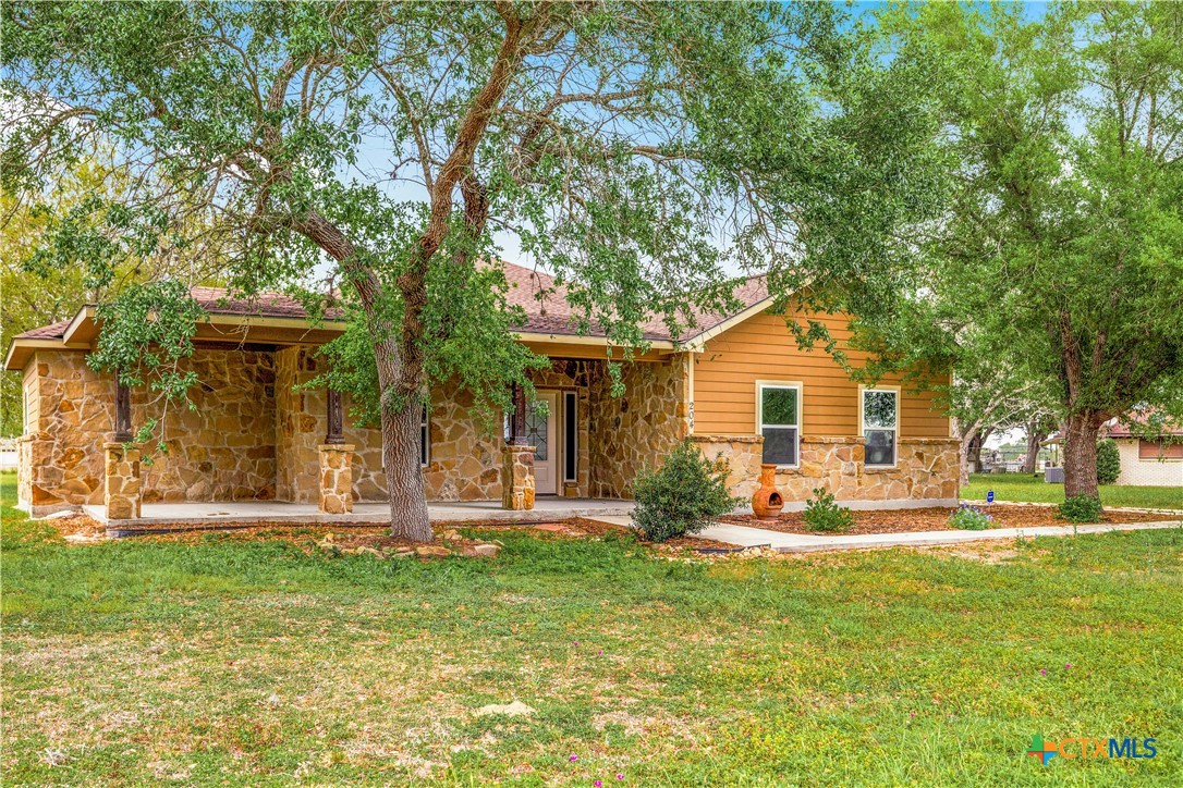 204 James Street Inez, TX 77968 - Photo 2 of 35 a front view of a house with a yard