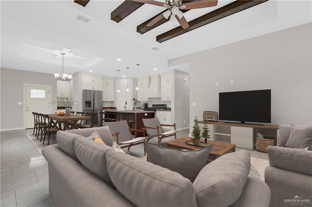 824 Lark Street Alamo, TX 78516 - Photo 4 of 17 Living area with a ceiling fan, light tile patterned floors, recessed lighting, and a chandelier
