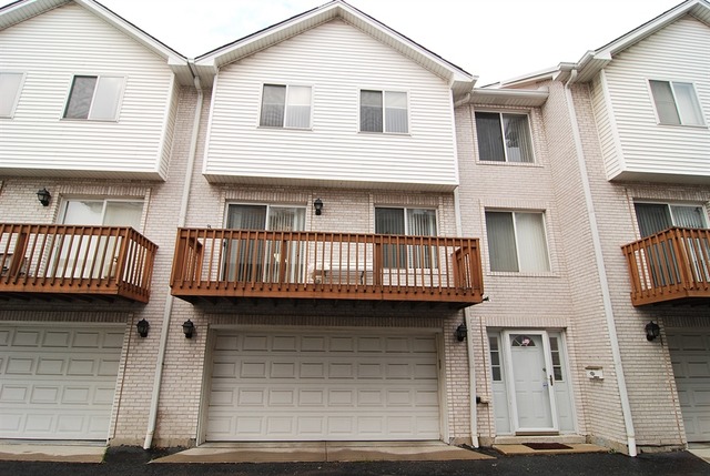 7290 Ogden Avenue, Unit 2 Riverside, IL 60546 - Photo 1 of 10 a view of a house with wooden deck