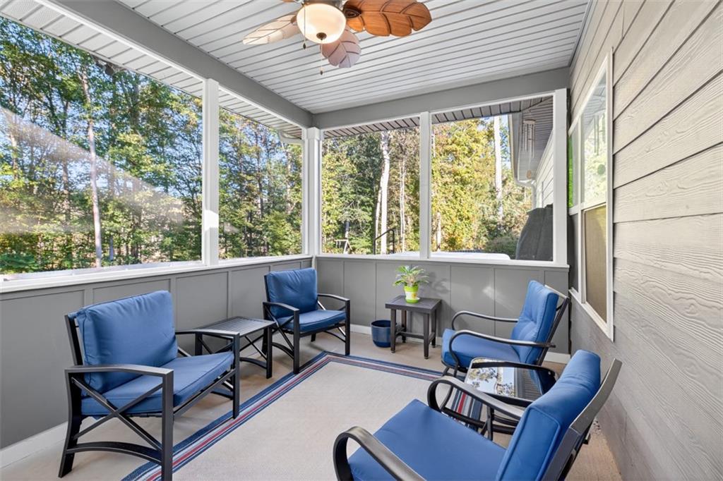 829 River Fall Drive Jefferson, GA 30549 - Photo 39 of 63 a view of patio with a table and chairs