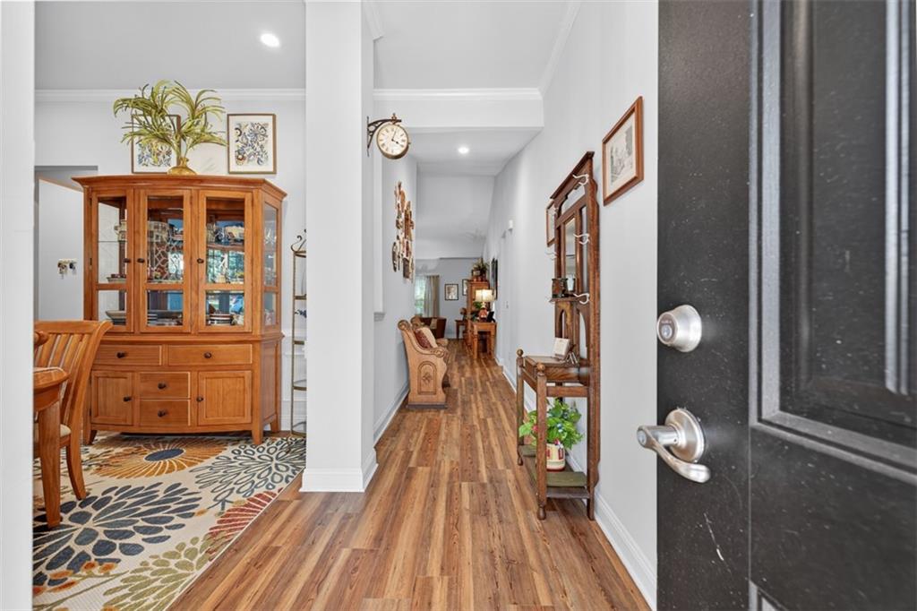 829 River Fall Drive Jefferson, GA 30549 - Photo 4 of 63 view of hall way with mirror and furniture