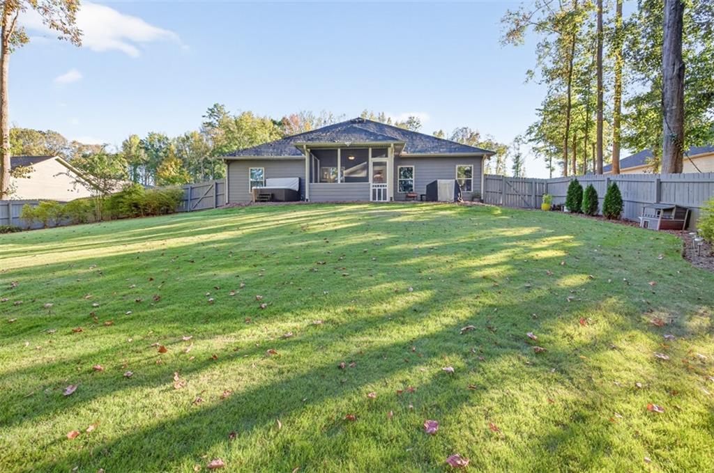 829 River Fall Drive Jefferson, GA 30549 - Photo 43 of 63 a front view of a house with a garden