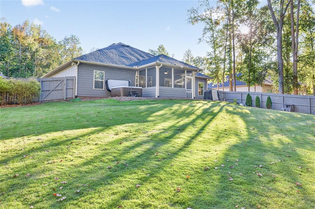 829 River Fall Drive Jefferson, GA 30549 - Photo 45 of 63 a view of a house with a big yard and large trees