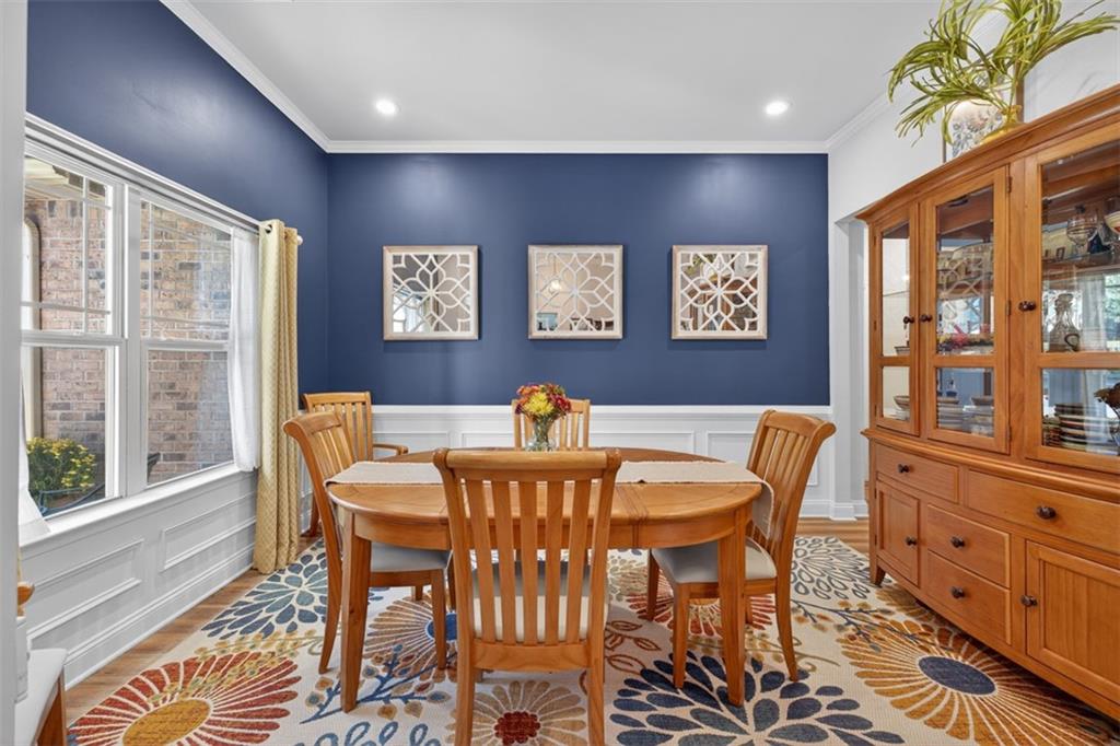 829 River Fall Drive Jefferson, GA 30549 - Photo 5 of 63 a view of a dining room with furniture large window and wooden floor