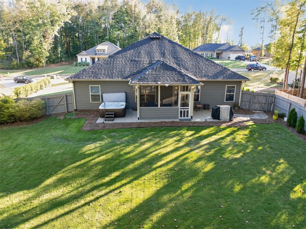 829 River Fall Drive Jefferson, GA 30549 - Photo 60 of 63 a swimming pool view with a seating space and a garden