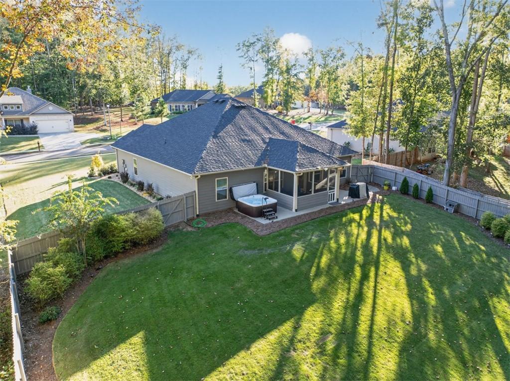 829 River Fall Drive Jefferson, GA 30549 - Photo 62 of 63 a aerial view of a house with swimming pool and sitting area