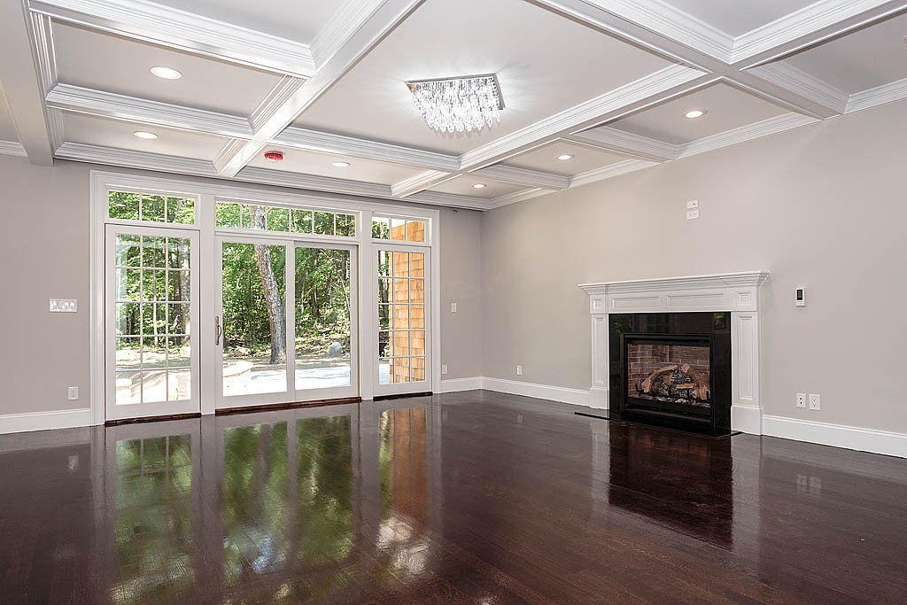 211 Sandy Pond Road Lincoln, MA 01773 - Photo 12 of 22 a view of an entryway with a floor to ceiling window and wooden floor