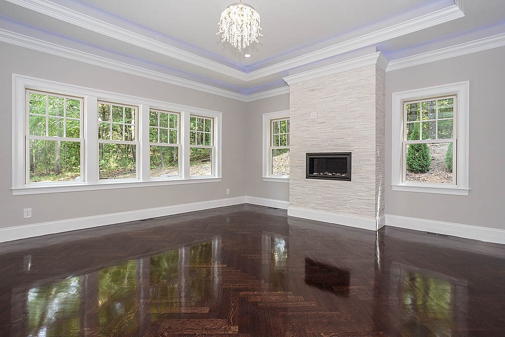 211 Sandy Pond Road Lincoln, MA 01773 - Photo 16 of 22 a view of an empty room with a window