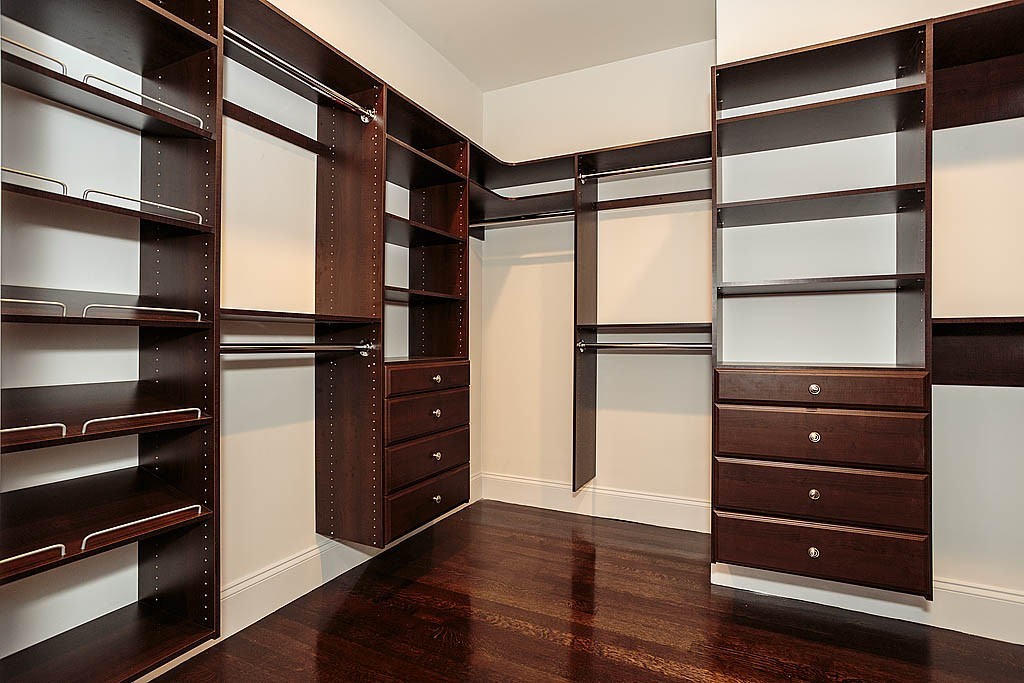 211 Sandy Pond Road Lincoln, MA 01773 - Photo 17 of 22 a view of walk in closet with empty racks