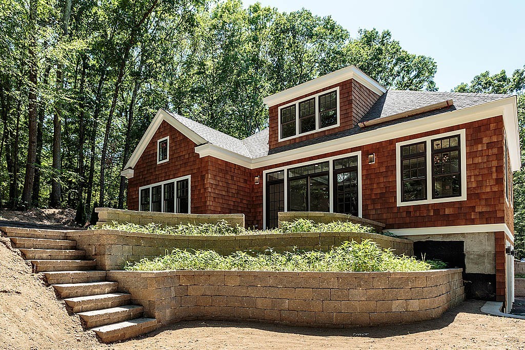 211 Sandy Pond Road Lincoln, MA 01773 - Photo 22 of 22 a front view of a house with a yard