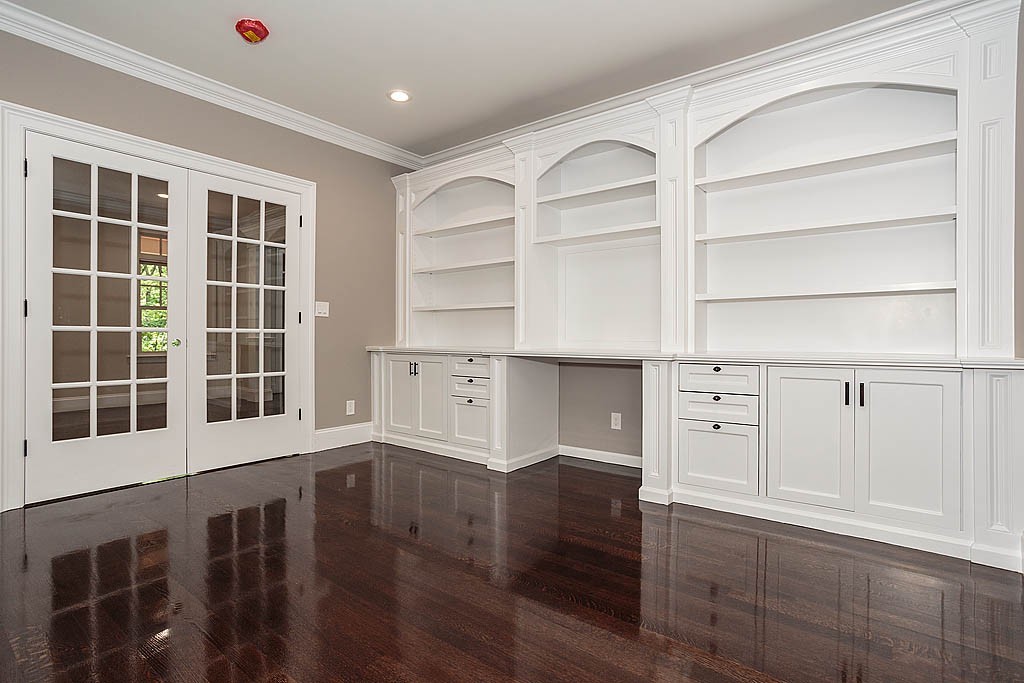211 Sandy Pond Road Lincoln, MA 01773 - Photo 5 of 22 a view of an empty room with wooden floor and a window
