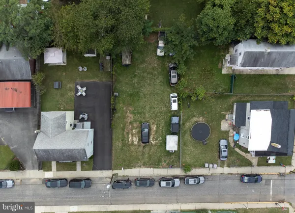 an aerial view of a house with outdoor space