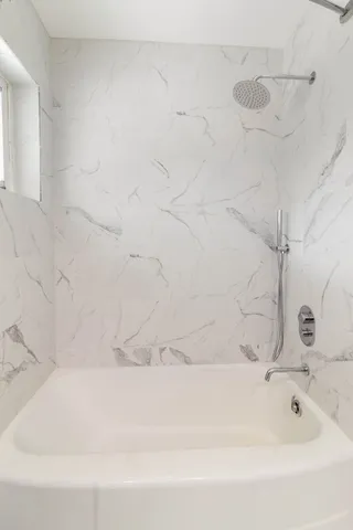 a bathroom with a bathtub
