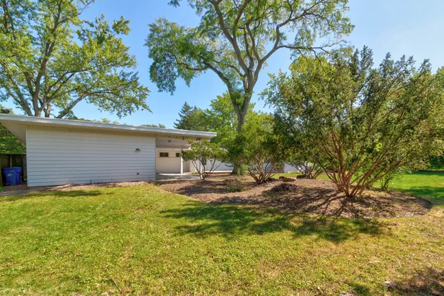 a house view with a backyard space