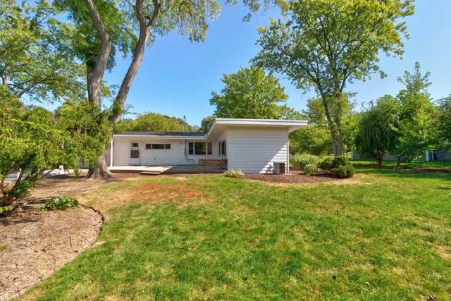a house view with a garden space