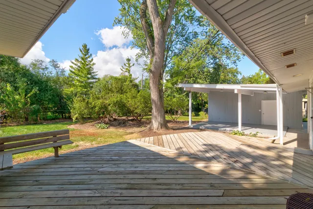 a view of swimming pool with lounge chair
