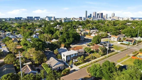 an aerial view of a house with a garden