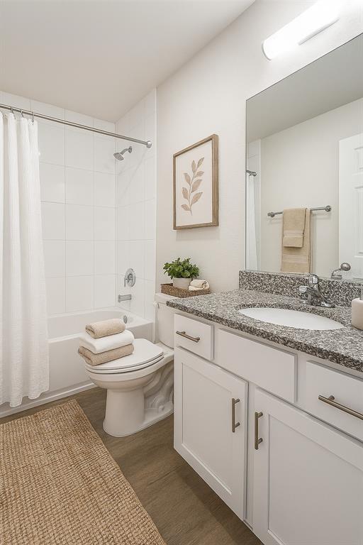 1145 South Apopka Avenue Inverness, FL 34452 - Photo 13 of 13 a bathroom with a granite countertop sink mirror vanity and toilet