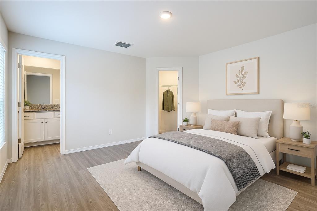 1145 South Apopka Avenue Inverness, FL 34452 - Photo 7 of 13 a bedroom with a bed and a view of room