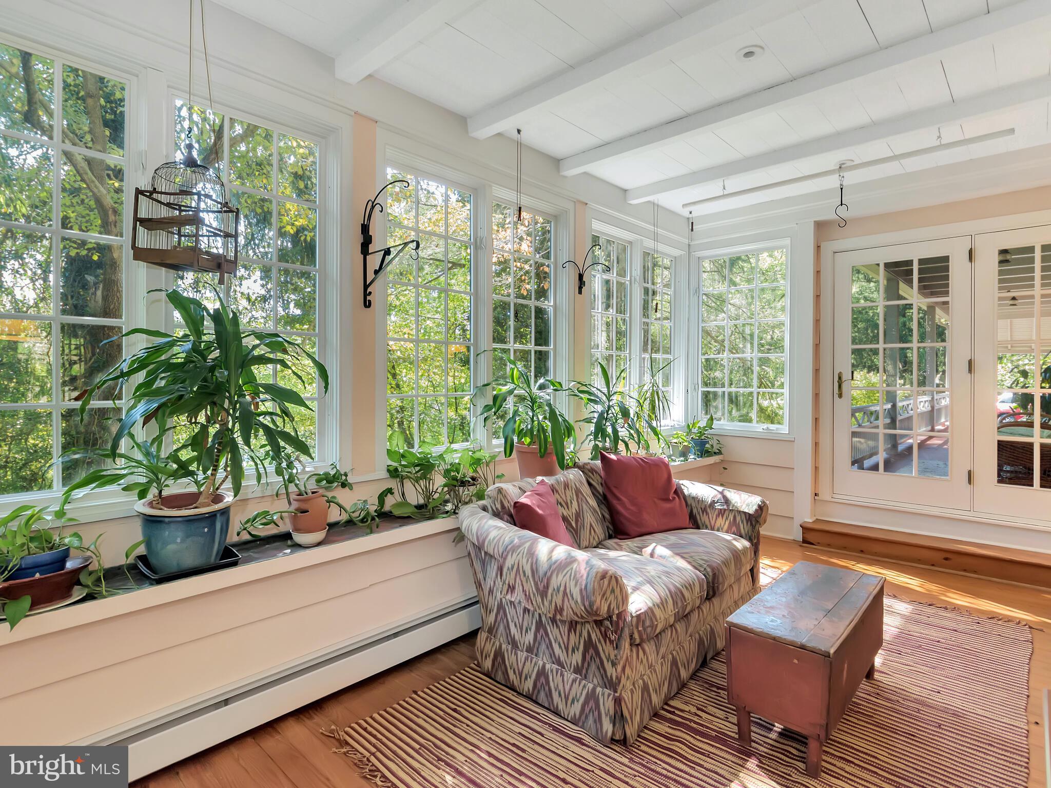 126 Bancroft Road Kennett Square, PA 19348 - Photo 12 of 43 Sunroom with French doors to front porch