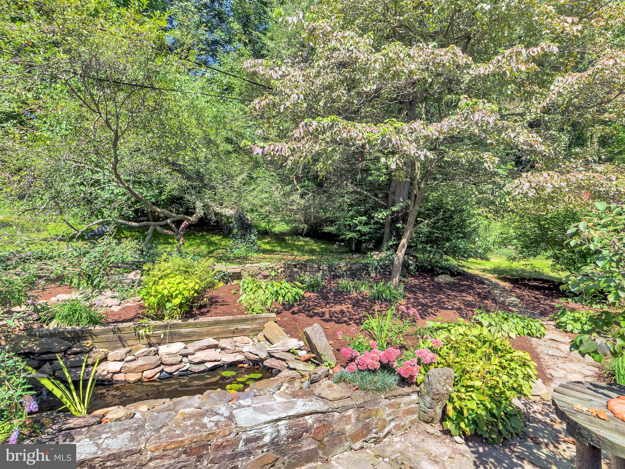 126 Bancroft Road Kennett Square, PA 19348 - Photo 42 of 43 Beautiful landscaping in backyard