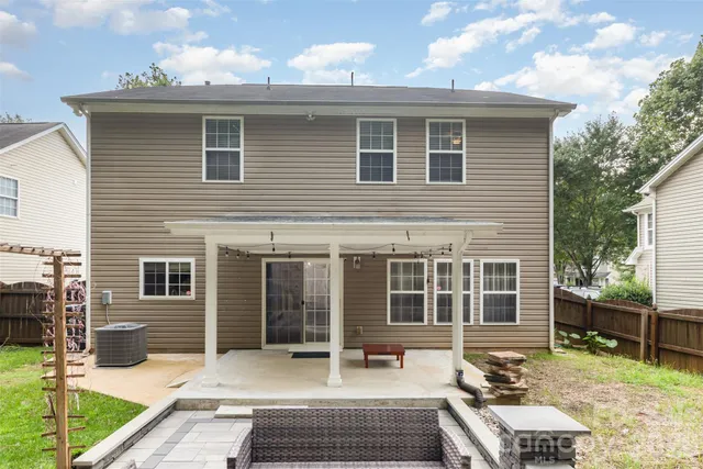 a swimming pool with glass door