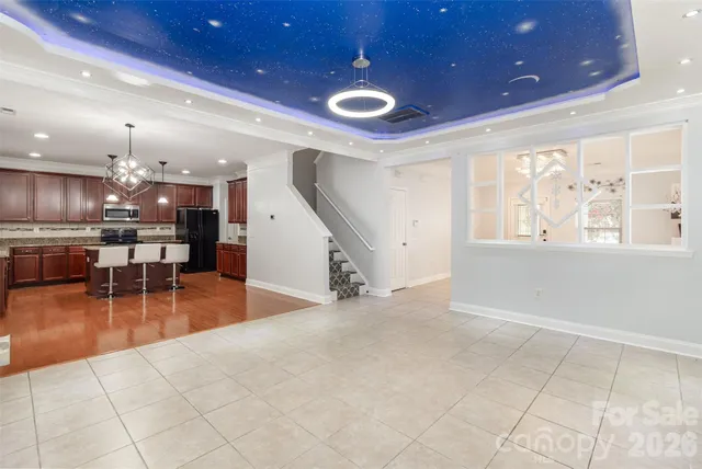 a view of a hall with chairs