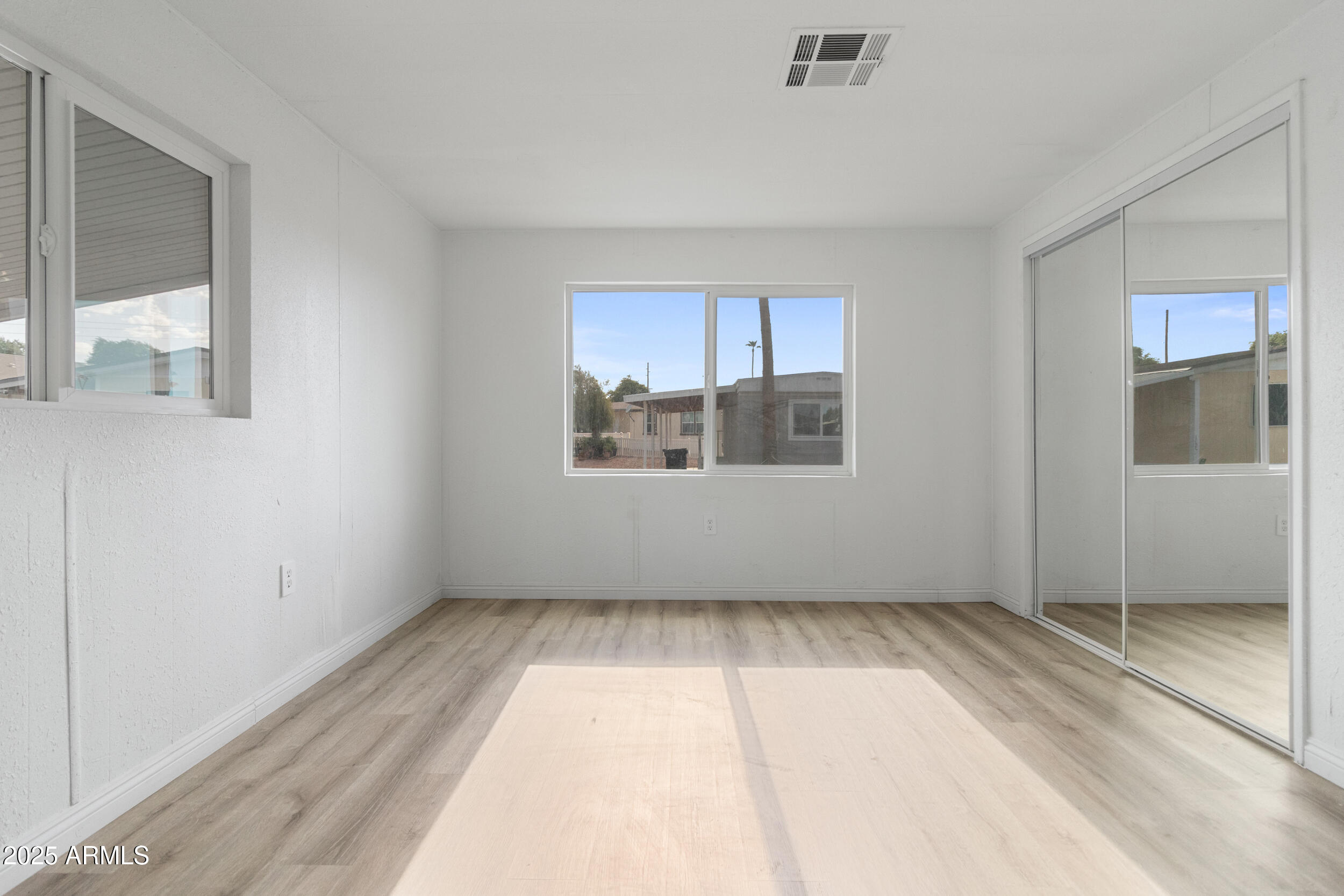 400 West Baseline Road, Unit 100 Tempe, AZ 85283 - Photo 16 of 46 a view of an empty room with a window