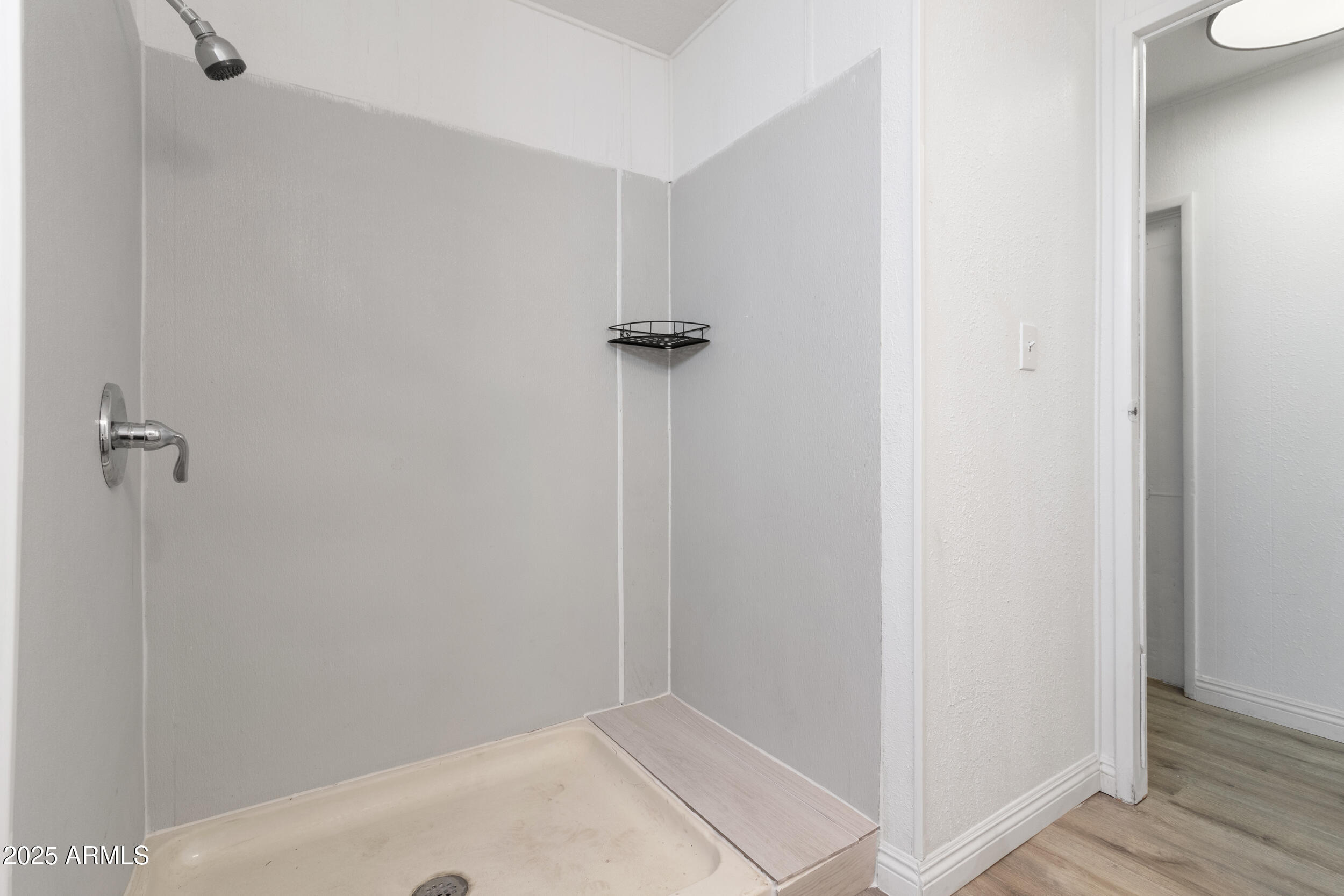400 West Baseline Road, Unit 100 Tempe, AZ 85283 - Photo 28 of 46 a view of a hallway with wooden floor