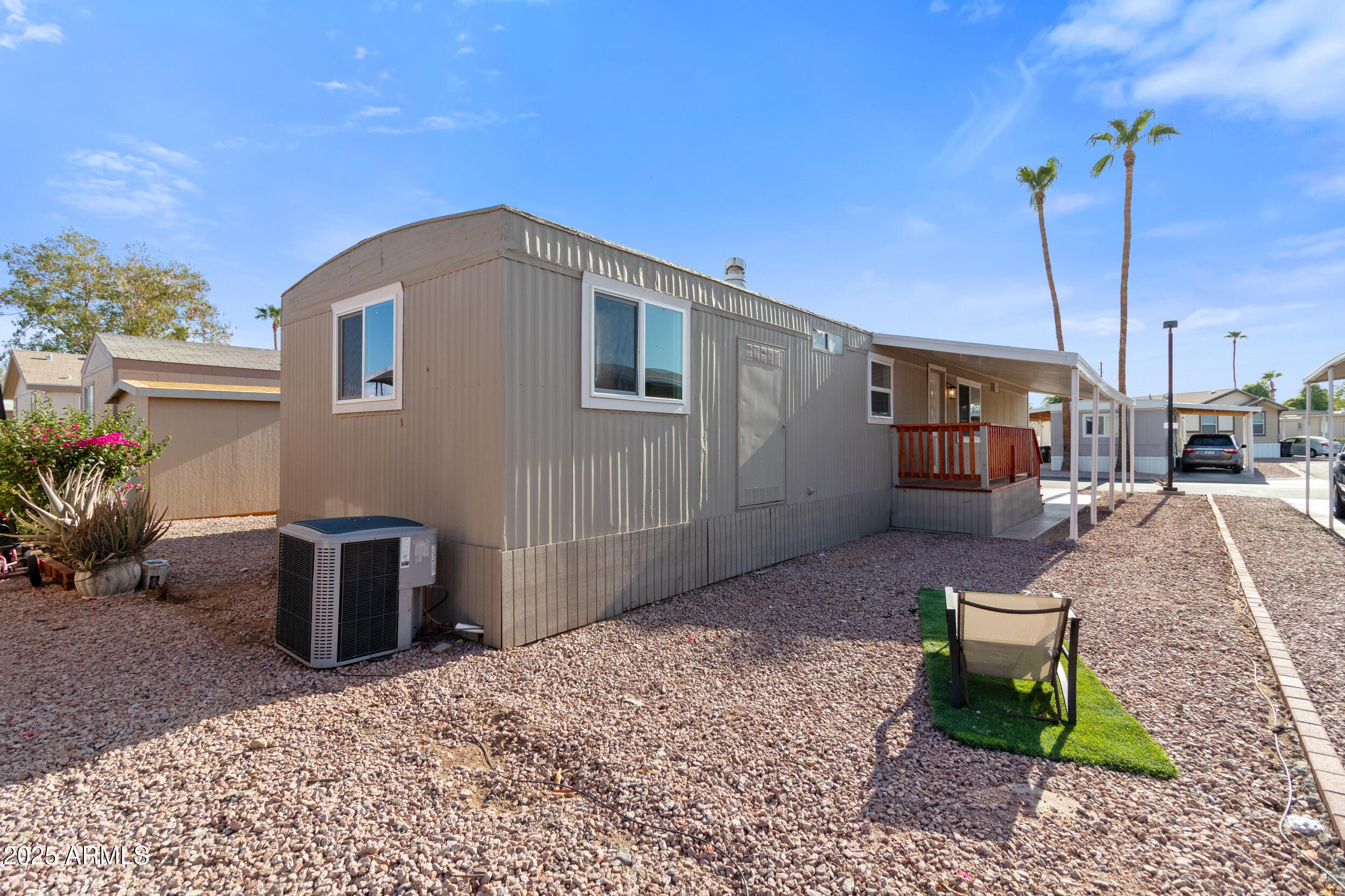 400 West Baseline Road, Unit 100 Tempe, AZ 85283 - Photo 31 of 46 a view of a backyard with sitting area