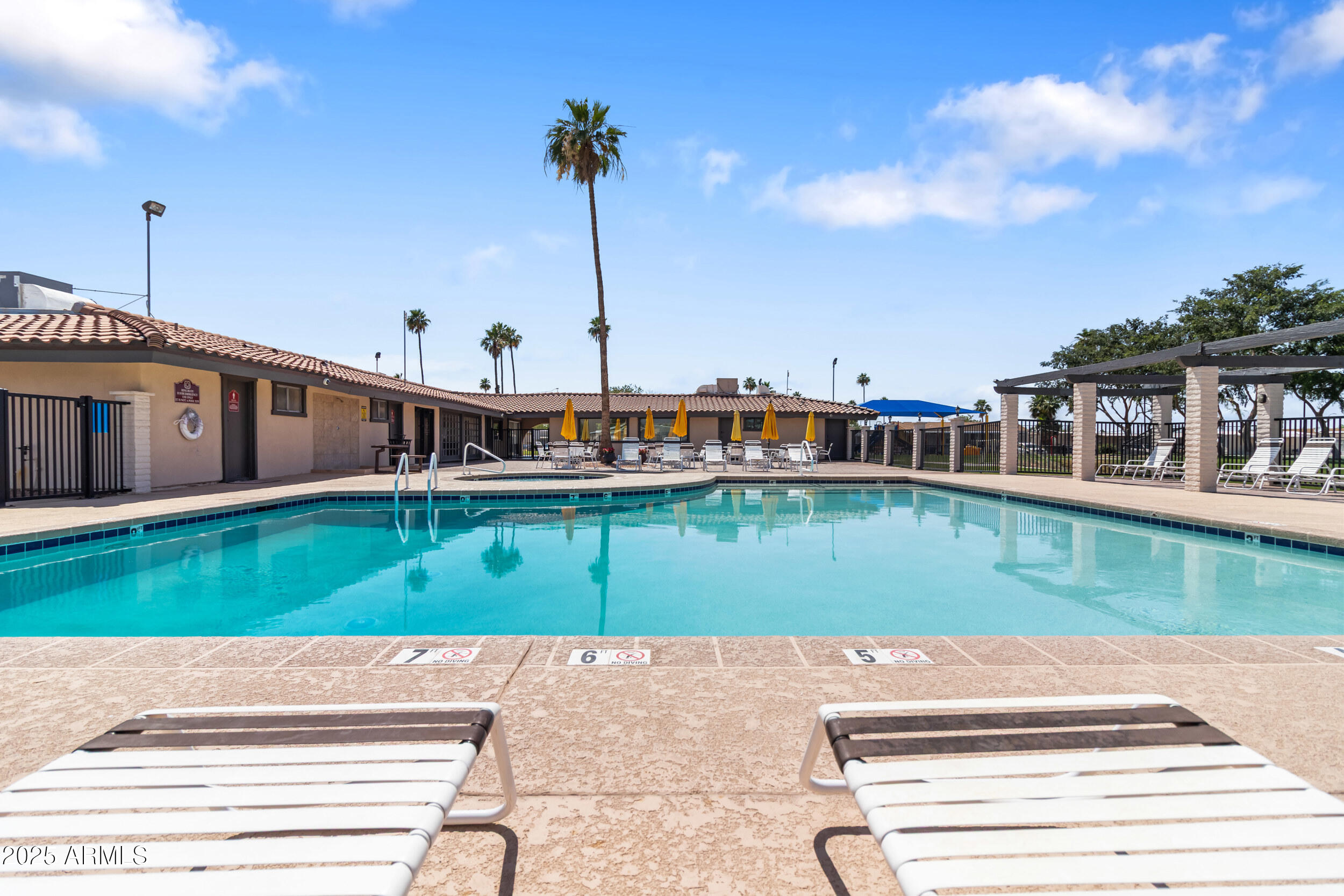 400 West Baseline Road, Unit 100 Tempe, AZ 85283 - Photo 36 of 46 a front view of a house with a yard