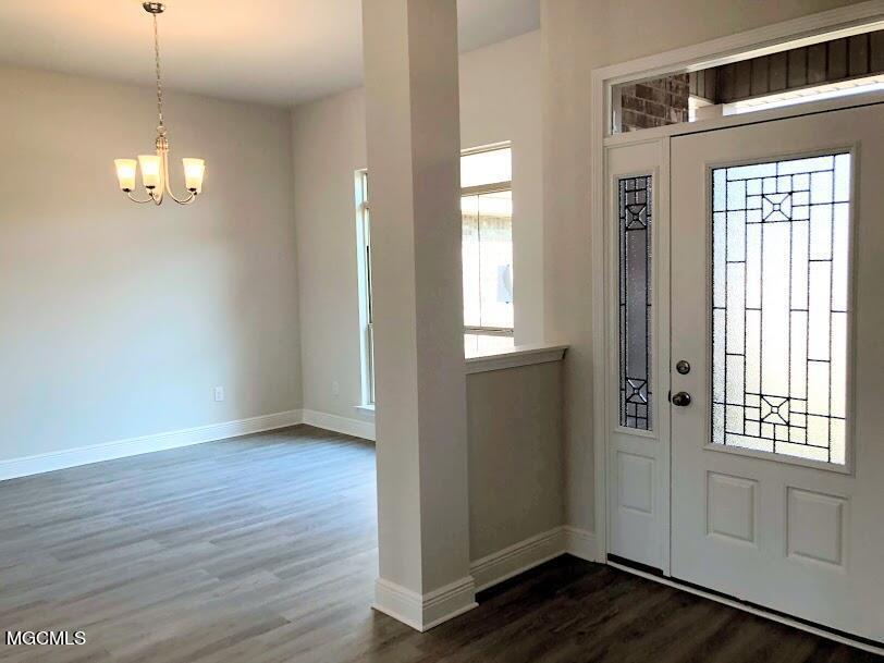 6218 Roxanne Way Biloxi, MS 39532 - Photo 14 of 32 foyer and formal dining room