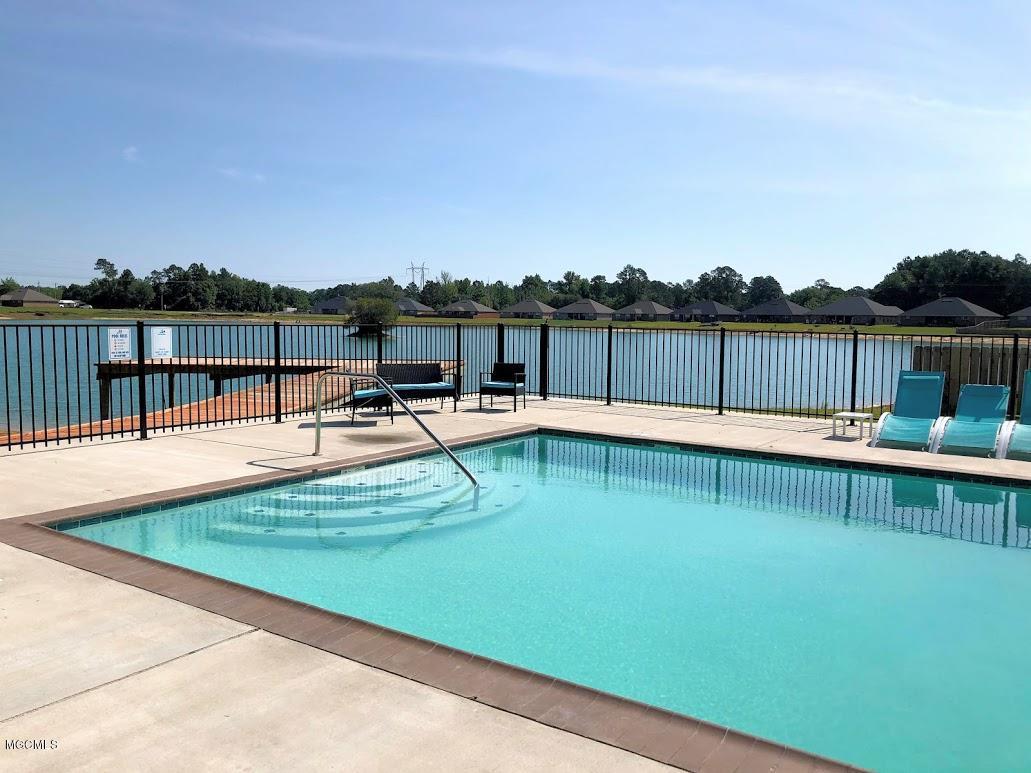 6218 Roxanne Way Biloxi, MS 39532 - Photo 24 of 32 Community pool and lake